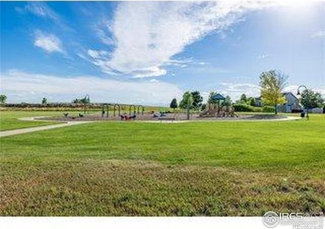 3664 Claycomb Ln, Johnstown, CO 80534 - view of home's community with a lawn