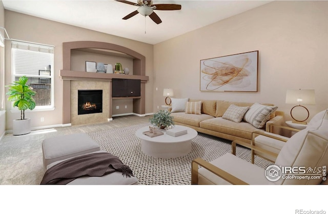 3664 Claycomb Ln, Johnstown, CO 80534 - carpeted living room with a ceiling fan and a fireplace