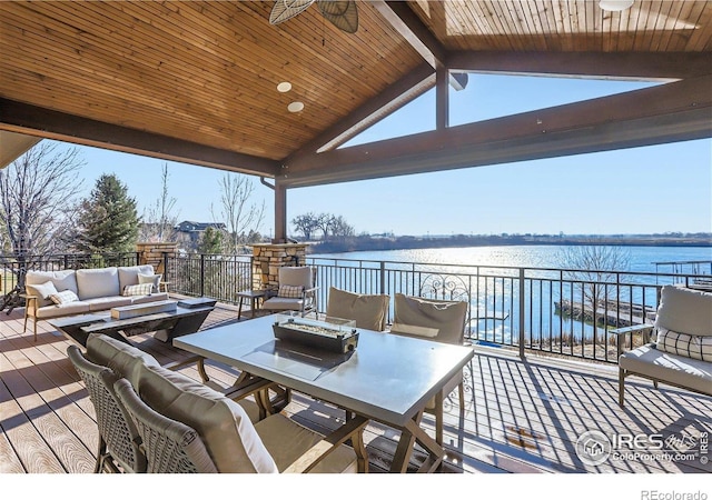 5763 Pelican Shores Dr, Longmont, CO 80504 - wooden deck with outdoor lounge area, a water view, and ceiling fan