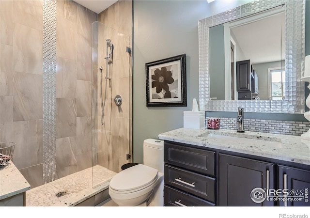 5763 Pelican Shores Dr, Longmont, CO 80504 - full bath featuring vanity, a stall shower, and tasteful backsplash