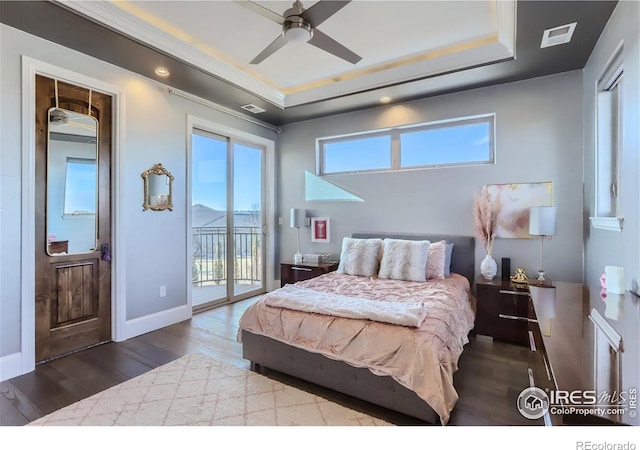5763 Pelican Shores Dr, Longmont, CO 80504 - bedroom featuring access to exterior, multiple windows, wood finished floors, and recessed lighting