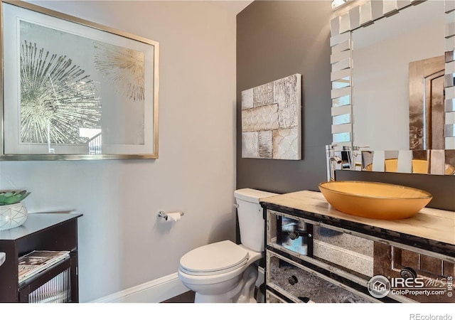 5763 Pelican Shores Dr, Longmont, CO 80504 - bathroom with baseboards and vanity