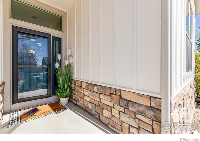 5457 Wishing Well Dr, Timnath, CO 80547 - entrance to property featuring stone siding