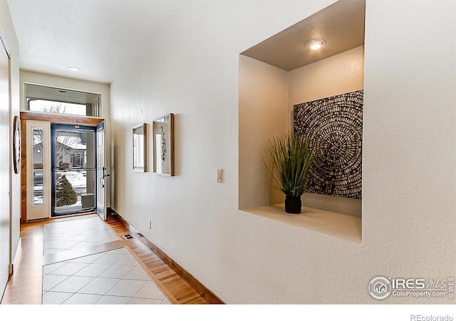 5457 Wishing Well Dr, Timnath, CO 80547 - tiled entryway with baseboards