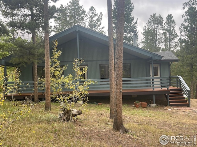 33 N Skinner Rd, Allenspark, CO 80510 - view of property exterior featuring a deck and stairway
