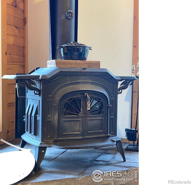 33 N Skinner Rd, Allenspark, CO 80510 - detailed view of a wood stove and wood finished floors