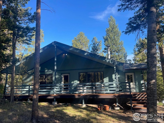 33 N Skinner Rd, Allenspark, CO 80510 - back of house featuring a wooden deck