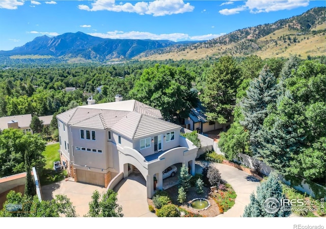 3747 Mountain Laurel Pl, Boulder, CO 80304 - aerial view of property and surrounding area with mountains and a heavily wooded area