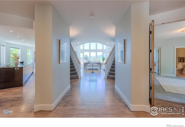 3747 Mountain Laurel Pl, Boulder, CO 80304 - hall featuring stairway, wood finished floors, and recessed lighting