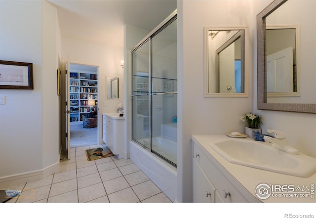 3747 Mountain Laurel Pl, Boulder, CO 80304 - full bathroom featuring vanity, tile patterned flooring, and bath / shower combo with glass door