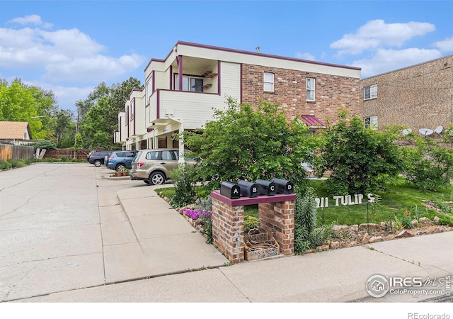 911 Tulip St Unit C, Longmont, CO 80501 - view of front of home with uncovered parking