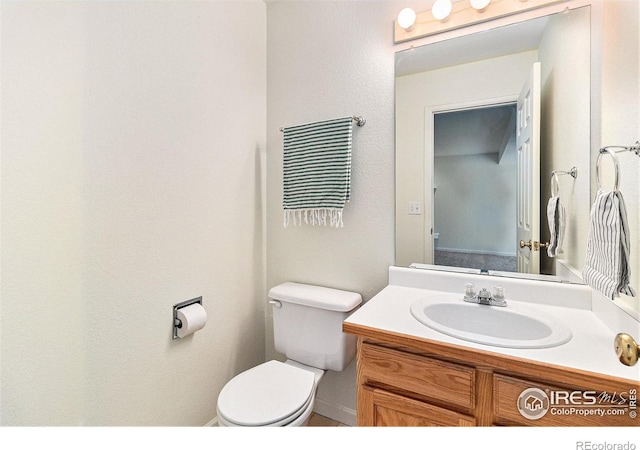 911 Tulip St Unit C, Longmont, CO 80501 - half bathroom with toilet and vanity