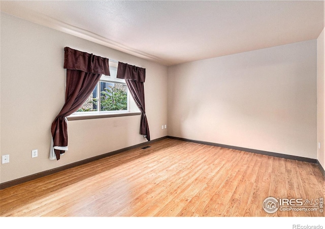 911 Tulip St Unit C, Longmont, CO 80501 - empty room with wood finished floors