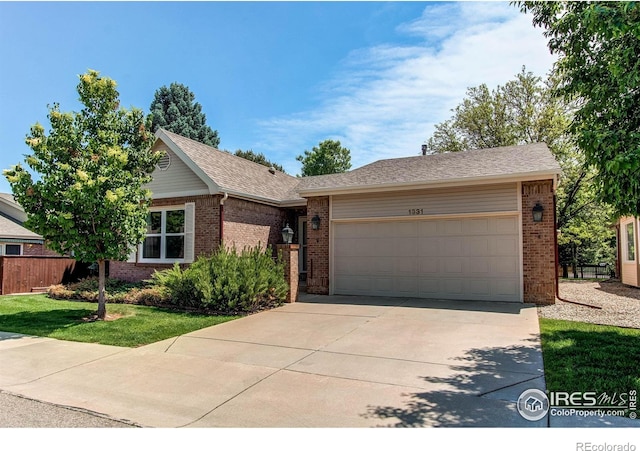 1331 Iva Ct, Fort Collins, CO 80525 - ranch-style house with brick siding, an attached garage, concrete driveway, and roof with shingles