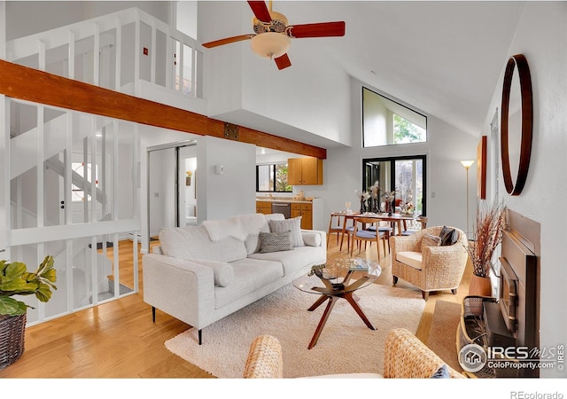 3880 Telluride Pl, Boulder, CO 80305 - living room featuring high vaulted ceiling, wood finished floors, and ceiling fan