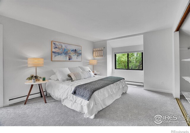 3880 Telluride Pl, Boulder, CO 80305 - bedroom with a baseboard radiator, carpet, and a wall unit AC