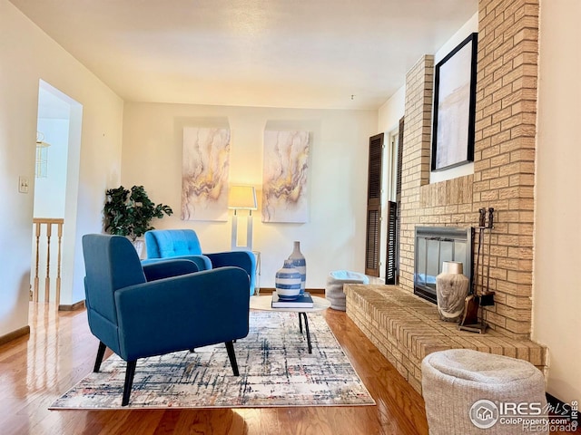 11198 W 59th Pl, Arvada, CO 80004 - living area with wood finished floors and a fireplace
