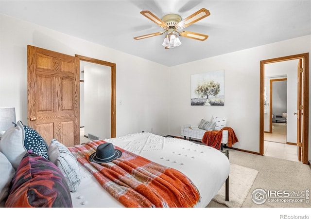 11198 W 59th Pl, Arvada, CO 80004 - bedroom featuring light carpet and ceiling fan