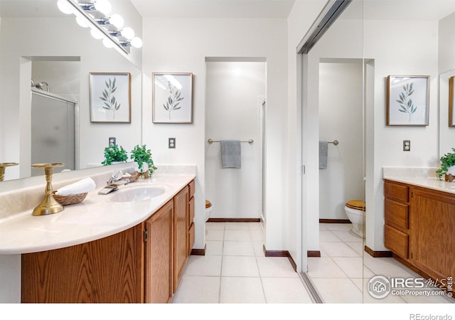 11198 W 59th Pl, Arvada, CO 80004 - full bath with vanity, a shower stall, and tile patterned flooring