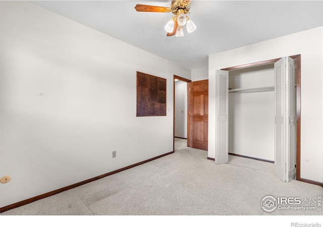 11198 W 59th Pl, Arvada, CO 80004 - unfurnished bedroom with carpet flooring, a closet, and a ceiling fan