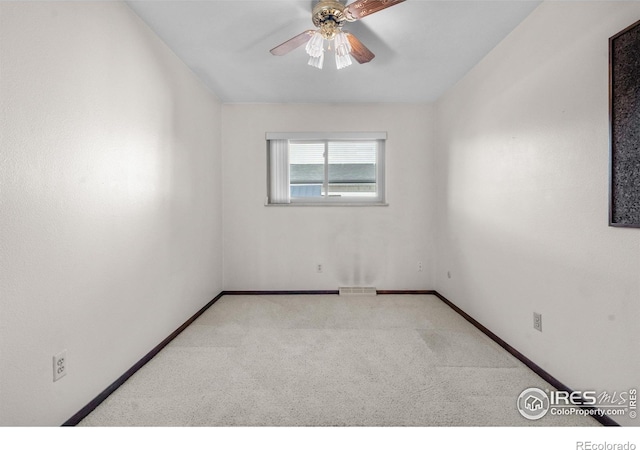 11198 W 59th Pl, Arvada, CO 80004 - empty room featuring carpet flooring and ceiling fan