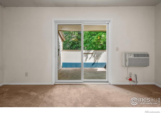 3465 Lochwood Dr Unit 91, Fort Collins, CO 80525 - carpeted empty room with baseboards and a wall unit AC