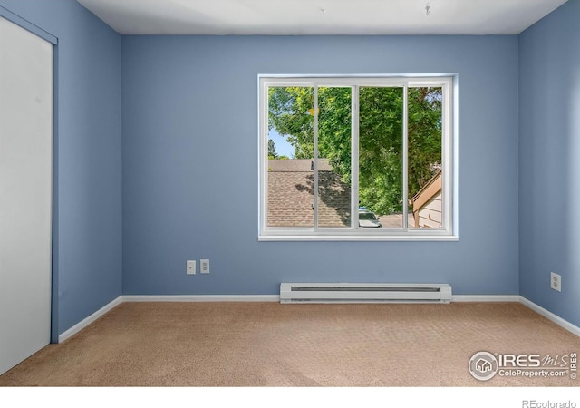 3465 Lochwood Dr Unit 91, Fort Collins, CO 80525 - spare room featuring baseboard heating and carpet flooring