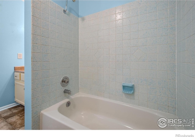 3465 Lochwood Dr Unit 91, Fort Collins, CO 80525 - bathroom featuring vanity and shower / tub combination