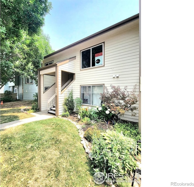 3465 Lochwood Dr Unit 91, Fort Collins, CO 80525 - view of front facade with a front yard