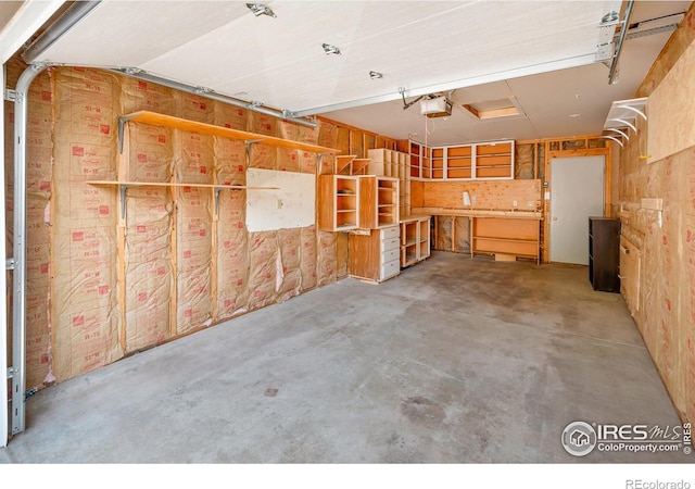 3465 Lochwood Dr Unit 91, Fort Collins, CO 80525 - garage with a garage door opener