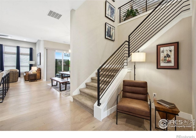 1768 Barefoot Dr, Windsor, CO 80550 - stairway with wood finished floors and baseboards