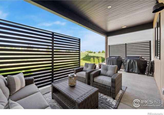1768 Barefoot Dr, Windsor, CO 80550 - view of patio featuring area for grilling and outdoor lounge area
