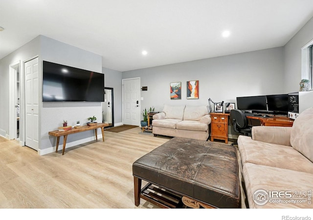 1900 Chalcis Dr Unit 42, Lafayette, CO 80026 - living area featuring wood finished floors, a desk, and recessed lighting