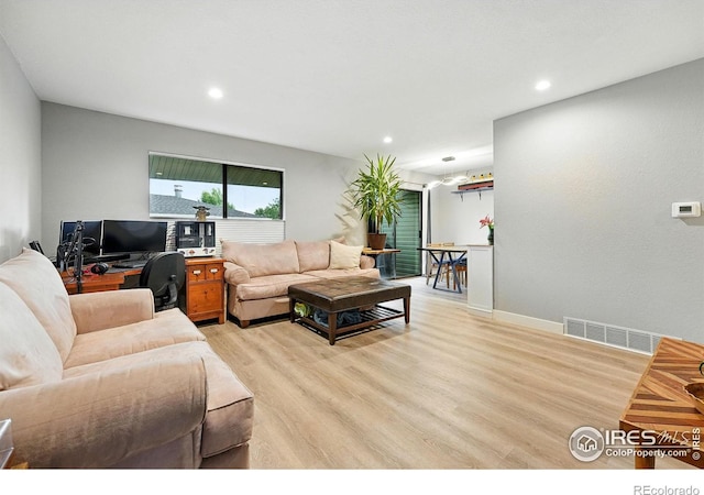 1900 Chalcis Dr Unit 42, Lafayette, CO 80026 - living room featuring light wood-style floors and recessed lighting
