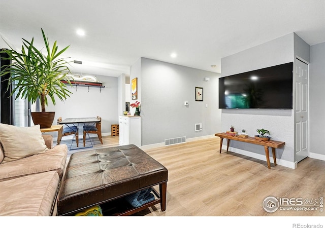 1900 Chalcis Dr Unit 42, Lafayette, CO 80026 - living area featuring wood finished floors and recessed lighting