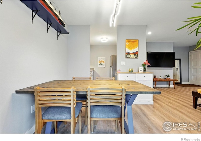 1900 Chalcis Dr Unit 42, Lafayette, CO 80026 - dining area with light wood-style flooring and recessed lighting