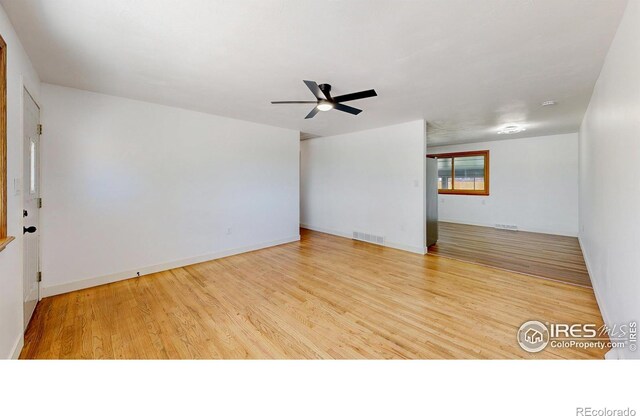 235 N 12th Ave, Brighton, CO 80601 - empty room with ceiling fan and wood finished floors