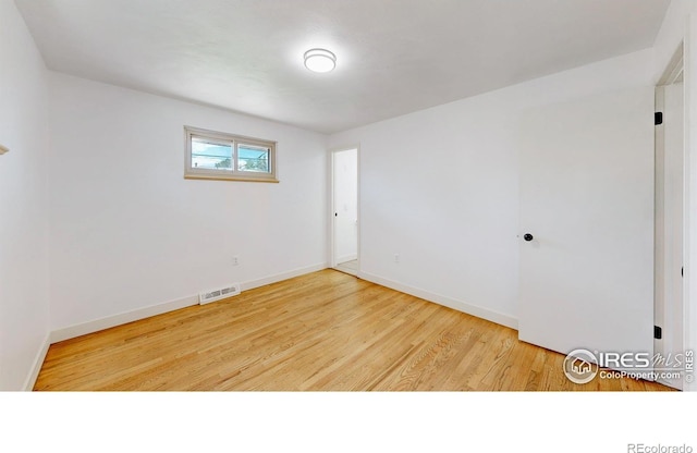 235 N 12th Ave, Brighton, CO 80601 - spare room featuring wood finished floors and baseboards