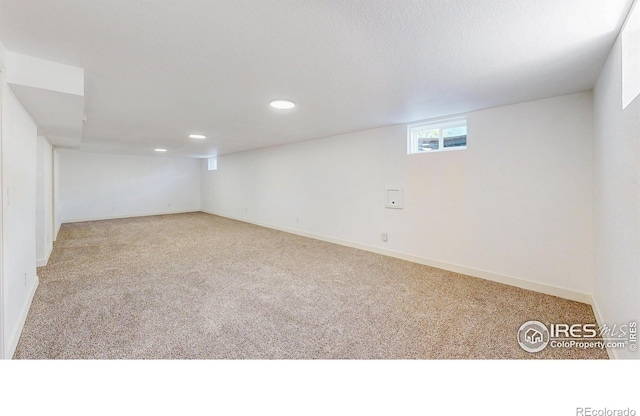 235 N 12th Ave, Brighton, CO 80601 - basement with carpet and recessed lighting
