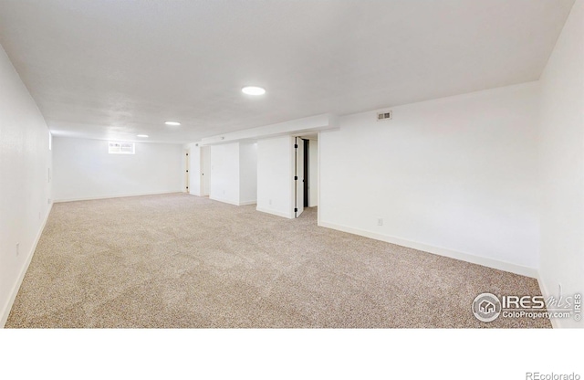 235 N 12th Ave, Brighton, CO 80601 - basement with carpet floors and recessed lighting