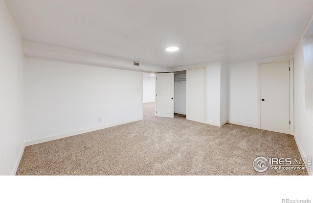 235 N 12th Ave, Brighton, CO 80601 - unfurnished bedroom featuring carpet, recessed lighting, and a closet