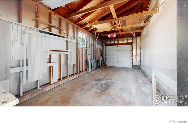 235 N 12th Ave, Brighton, CO 80601 - garage featuring a garage door opener