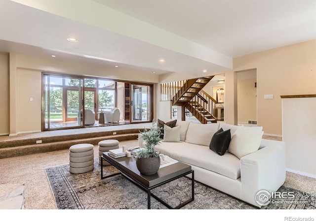 7975 Anchor Dr, Longmont, CO 80504 - living area with stairs, recessed lighting, and carpet