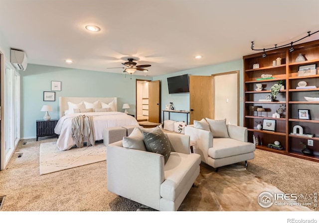 7975 Anchor Dr, Longmont, CO 80504 - carpeted bedroom featuring an AC wall unit and recessed lighting