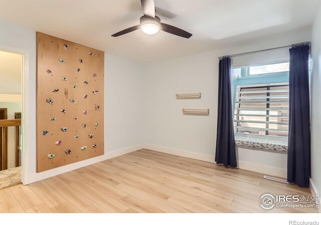 7975 Anchor Dr, Longmont, CO 80504 - unfurnished room with ceiling fan and light wood-style flooring
