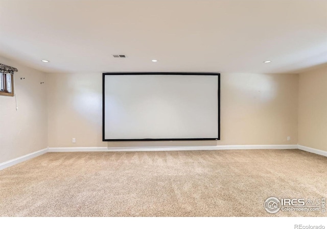7975 Anchor Dr, Longmont, CO 80504 - carpeted home theater room featuring recessed lighting