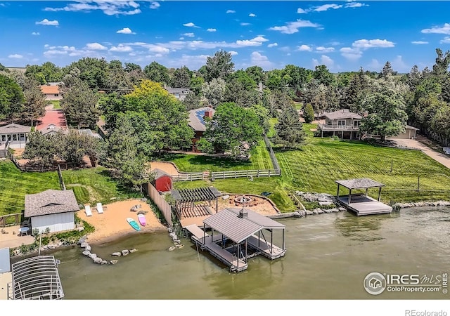 7975 Anchor Dr, Longmont, CO 80504 - view from above of property featuring a large body of water and a tree filled landscape