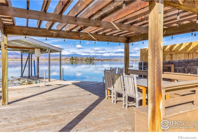 7975 Anchor Dr, Longmont, CO 80504 - dock featuring a water view and boat lift
