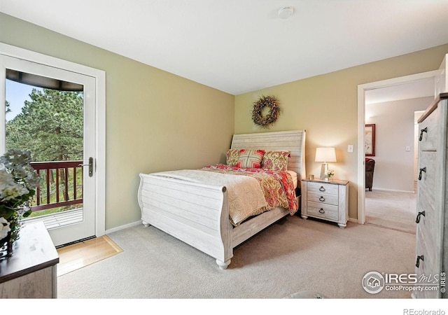 178 Balsam Ln, Boulder, CO 80304 - carpeted bedroom with access to exterior and baseboards