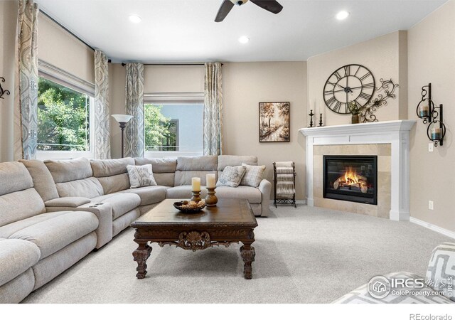 1976 Cayman Dr, Windsor, CO 80550 - living area with ceiling fan, recessed lighting, a fireplace, and carpet